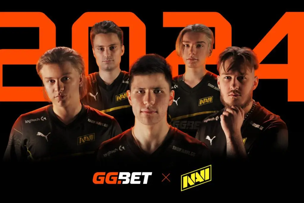 Esports team members from Natus Vincere (NAVI) wearing their official GG.BET-branded jerseys, announcing the continuation of their sponsorship deal for 2024.