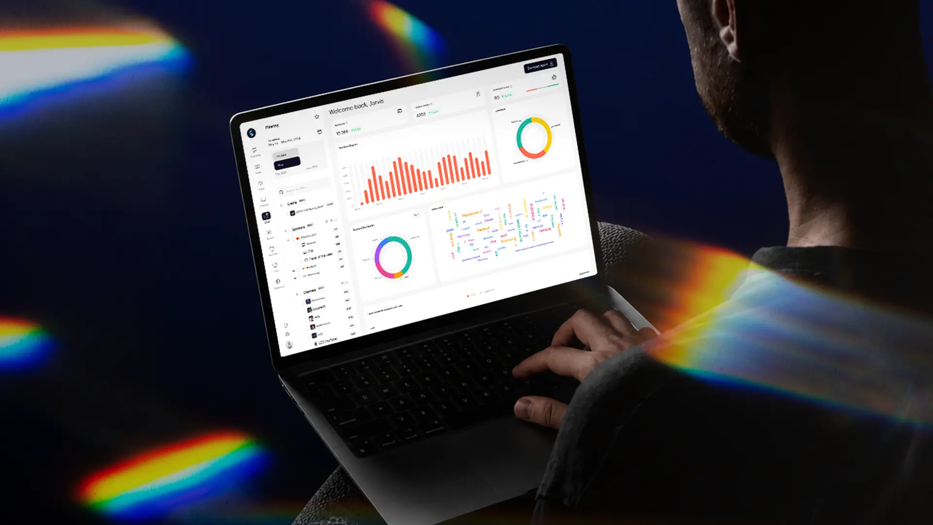 Analyst reviewing a sponsorship analytics software dashboard with exposure charts and media value data on a laptop