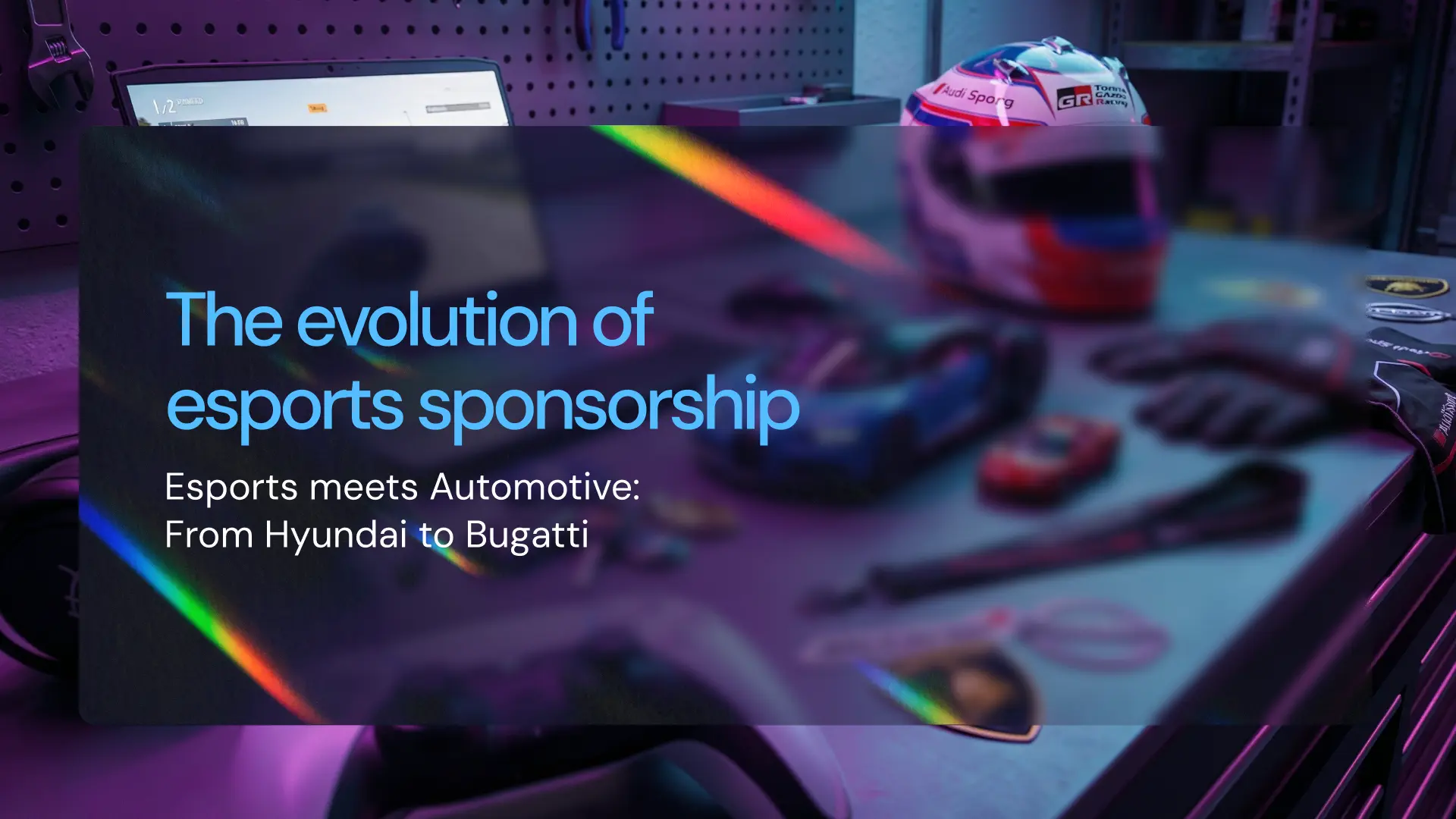 Esports desk setup with a racing helmet and gaming equipment, illustrating the evolution of esports sponsorship as automotive brands expand into competitive gaming.
