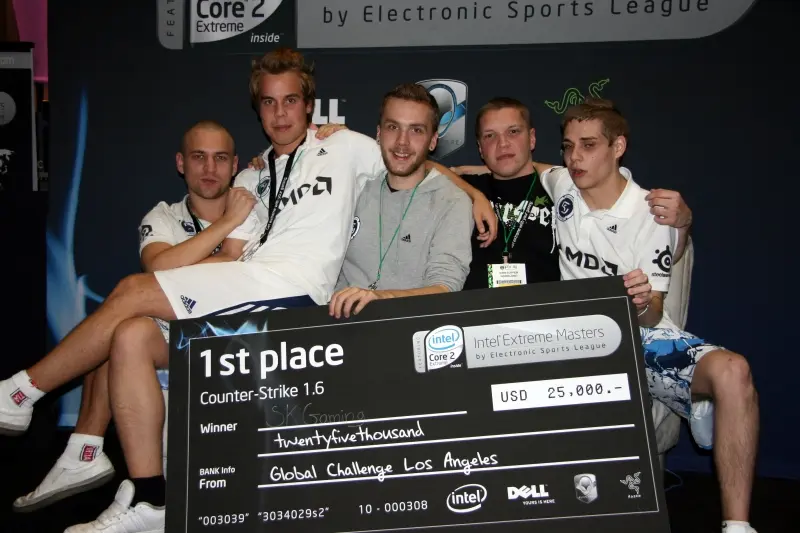 Early esports sponsorships example showing SK Gaming team celebrating first place at Intel Extreme Masters with AMD and Dell logos.