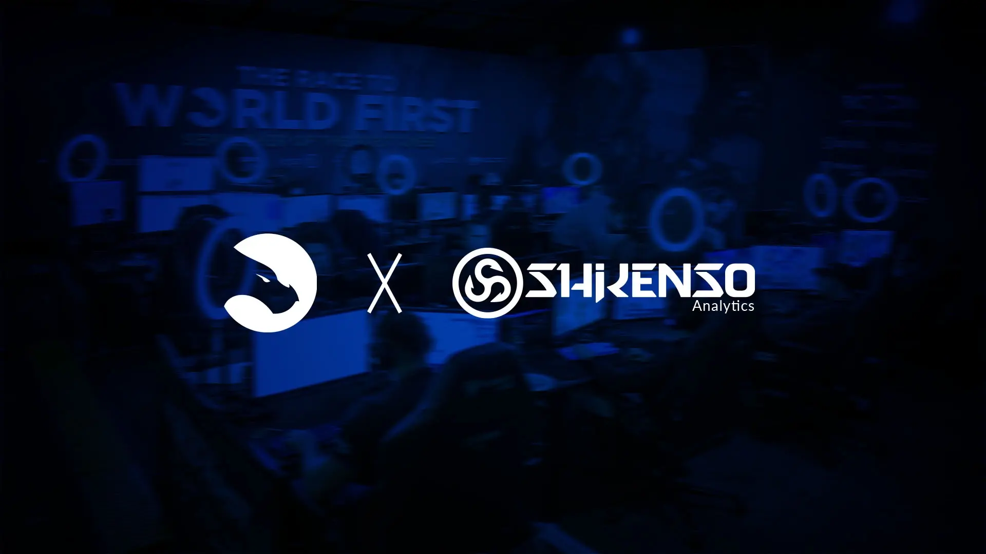 Partnership graphic showing a white animal head logo on the left and the Shikenso Analytics logo on the right, separated by an 'x', over a dark blue background of an esports event with players and computer setups. A large blurred banner in the back reads 'The Race to World First'.